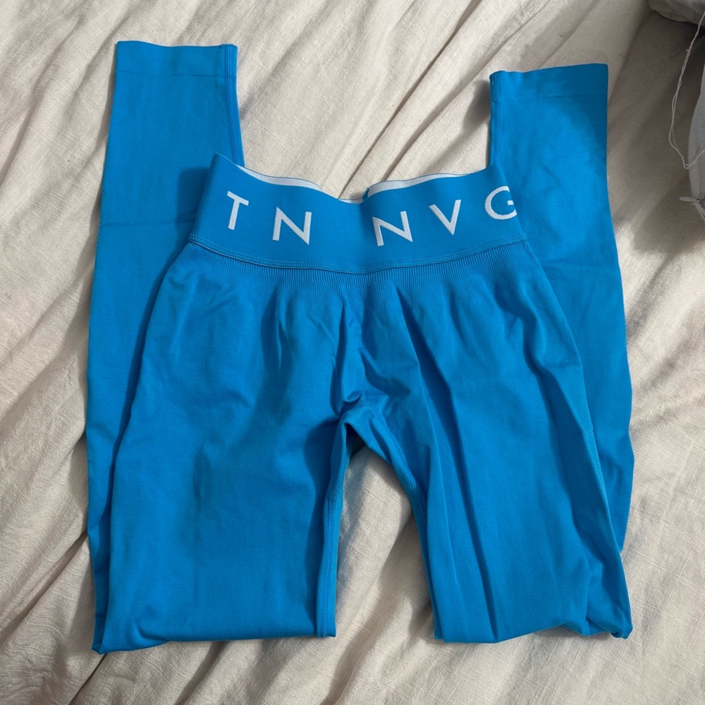 leggings by nvgtn blue logo 
Small
Worn once excellent like new condition